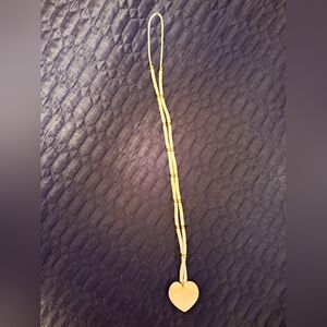 Heart Conch shell pendant with heishi shells & gold beads. 20" long native made